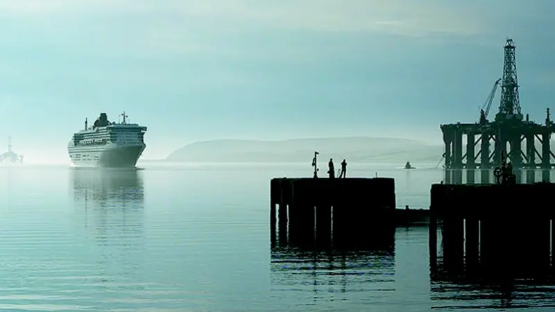 The Queen Mary 2 approaches moorings at Invergordons Admiralty Pier this summer.