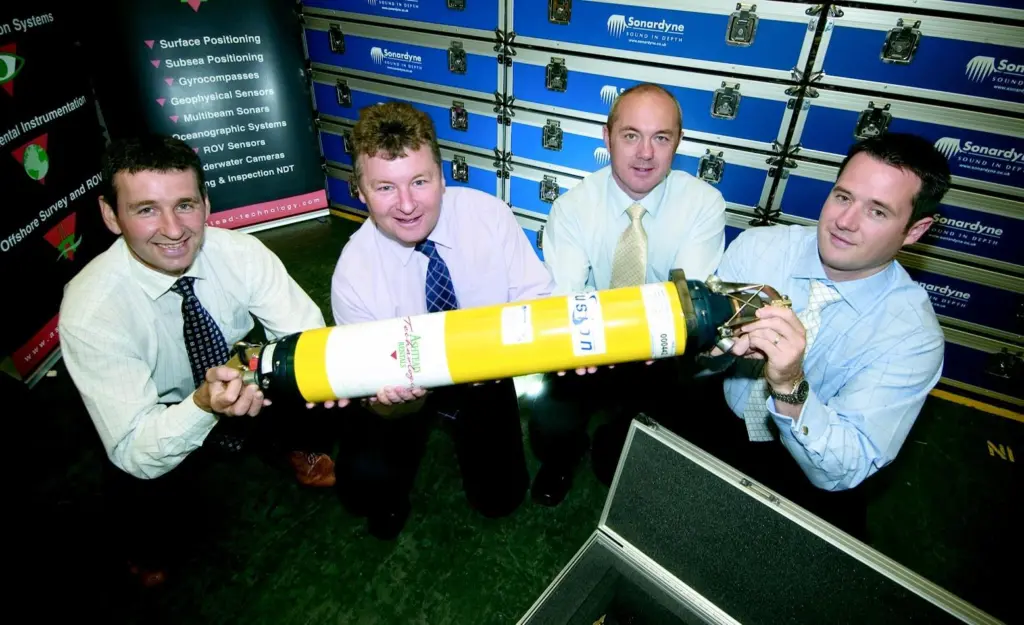Celebrating their latest investment in acoustic wideband systems, Ashtead Technology Rentals managing director Andy Doggett and sales manager Colin Erskine with John MacLoed and Derek Donaldson of Solardyne.