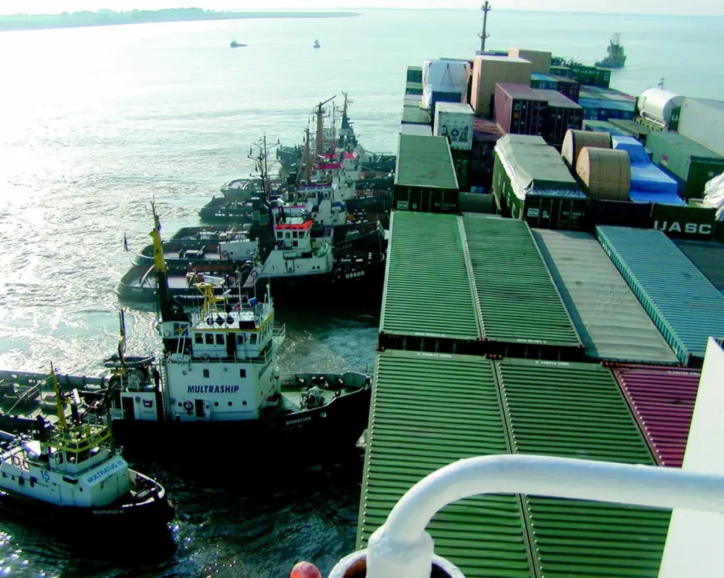Multraship tugs are seen pushing the damaged containership Fowairet earlier this month.