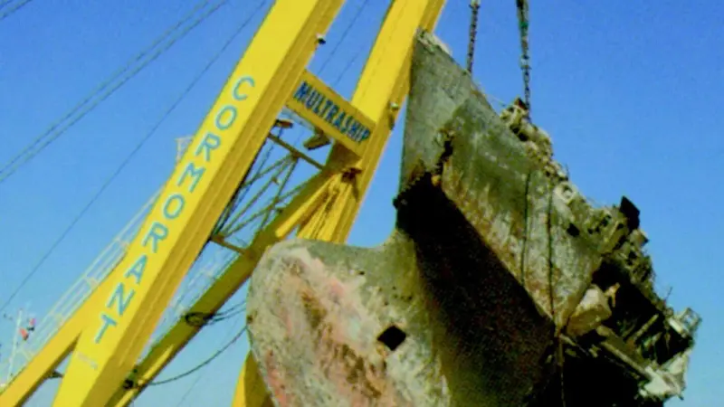 The floating sheerlegs Cormorant has kept busy of late in the Danube, seen here lifting the bow of the sunken cargo ship Rostok.