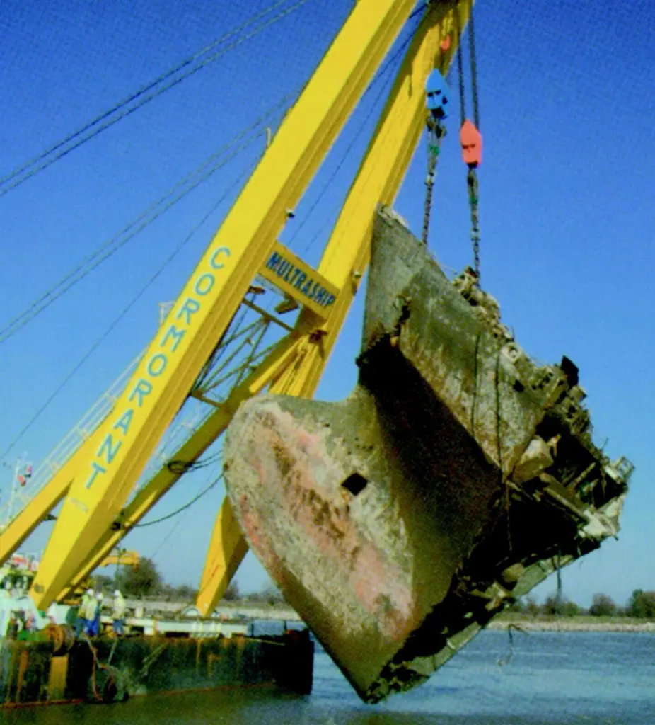 The floating sheerlegs Cormorant has kept busy of late in the Danube, seen here lifting the bow of the sunken cargo ship Rostok.