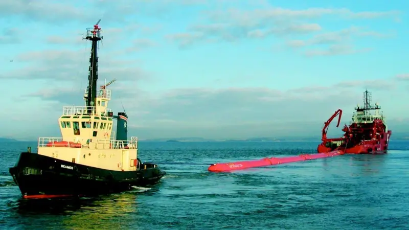 A Pelamis wave energy device is deployed.