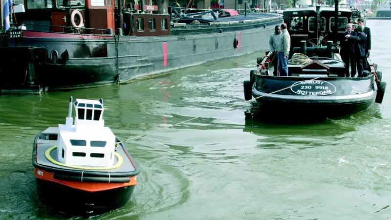 A 4m manned model tug with a DOT system tows a full size tug through the Rotterdam canal system.