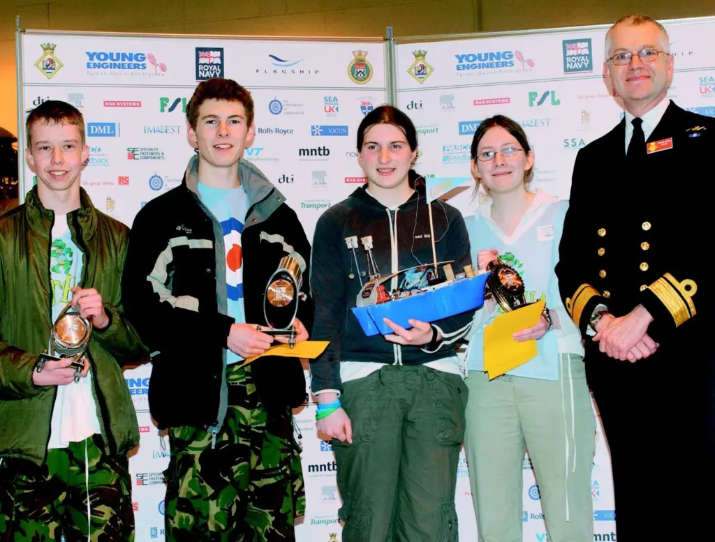 The winning team from Bishops Castle Community College receive prize from FOTR Admiral Borley.