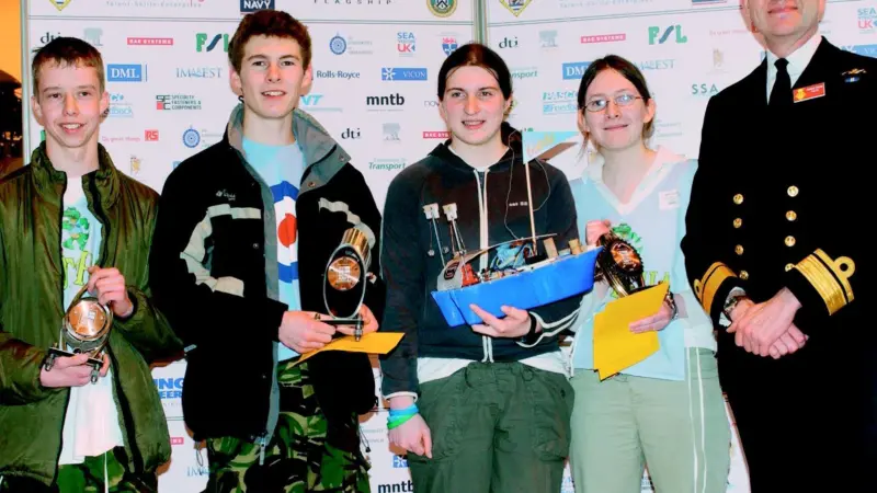 The winning team from Bishops Castle Community College receive prize from FOTR Admiral Borley.