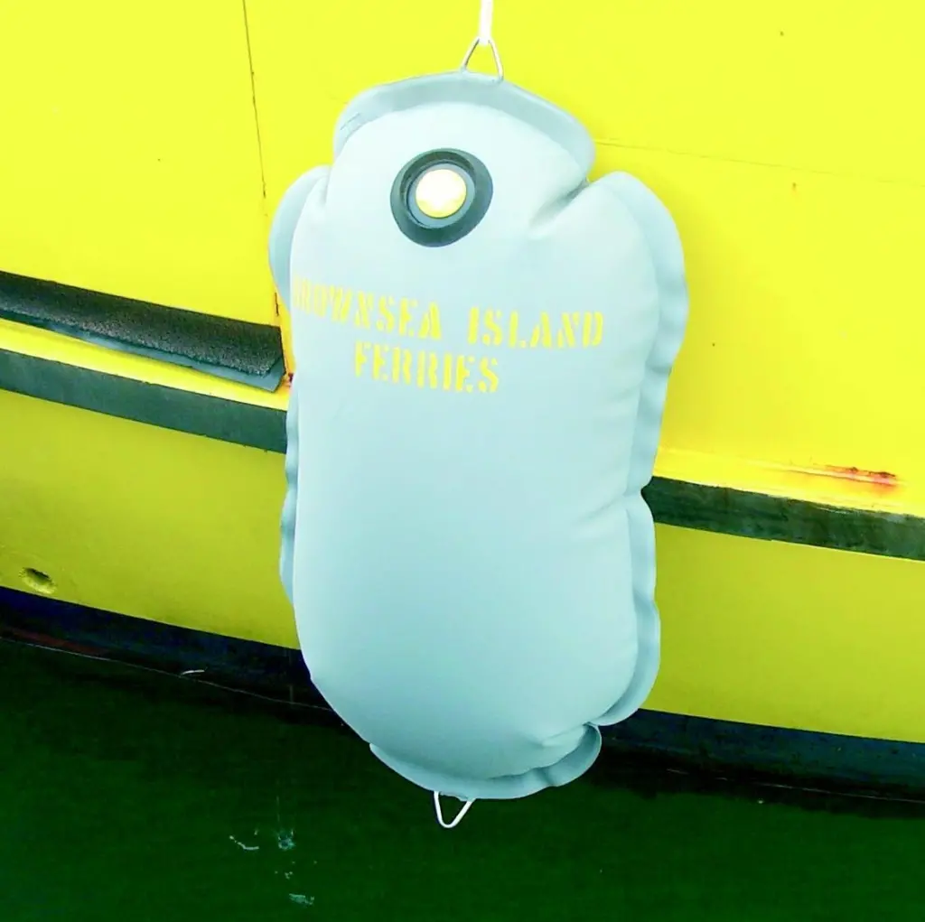 An Avon Fabrications inflatable fender as deployed on the Brownsea Island Ferry in Poole Harbour UK.