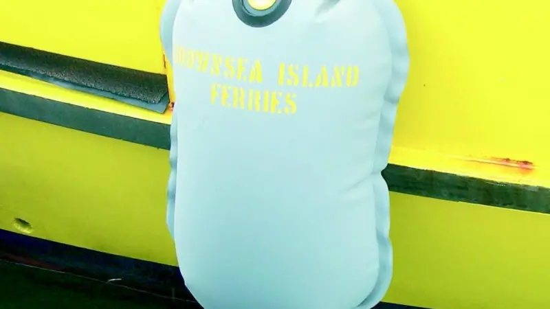 An Avon Fabrications inflatable fender as deployed on the Brownsea Island Ferry in Poole Harbour UK.
