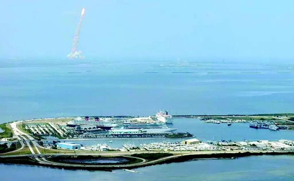Cruise ships at Port Canaveral in Florida as a Space Shuttle takes off in the background. Photo courtesy of AAPA.