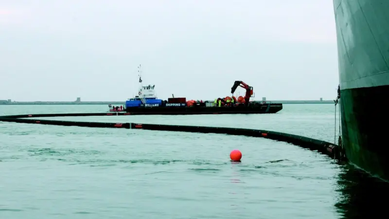 Special magnets designed and manufactured by Miko Marine attached an oil containment boom to a simulated casualty during Exercise Bluewater in March.