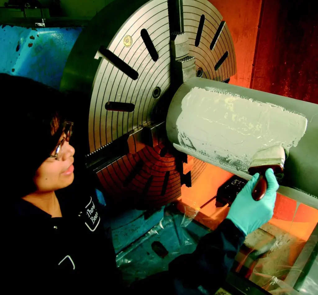 Thor-Coat is easily applied to a propeller shaft by brush.