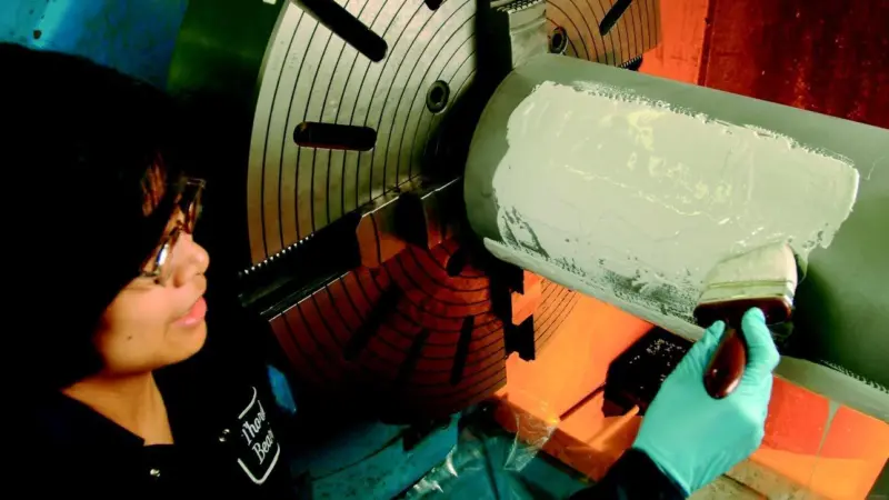 Thor-Coat is easily applied to a propeller shaft by brush.