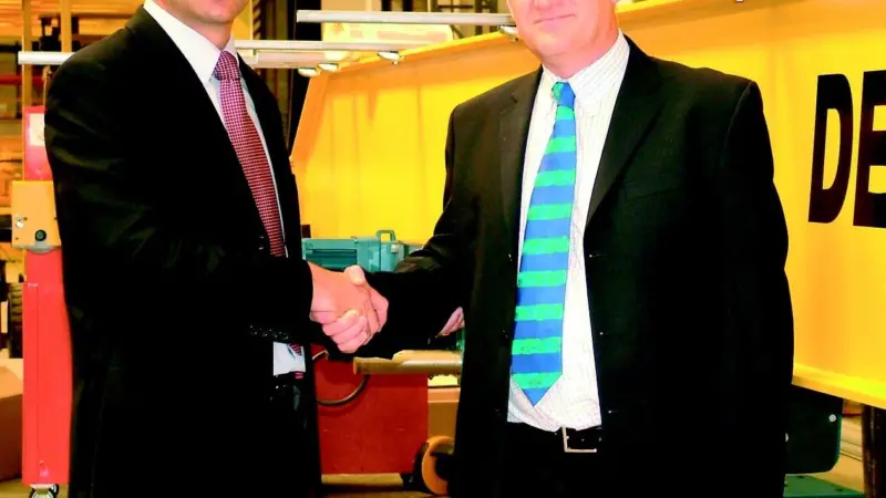 Certex sales and marketing director Charles Gillespie (right) confirms the distribution agreement with Demag UK sales director Tarik Alkhalil.