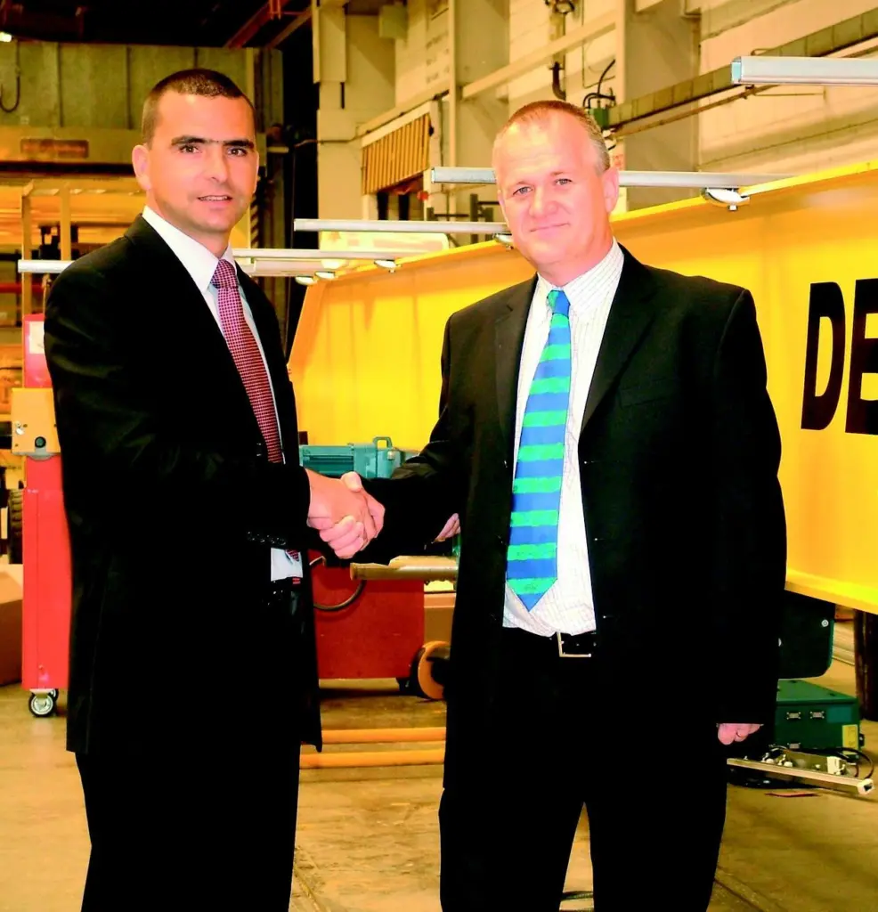 Certex sales and marketing director Charles Gillespie (right) confirms the distribution agreement with Demag UK sales director Tarik Alkhalil.