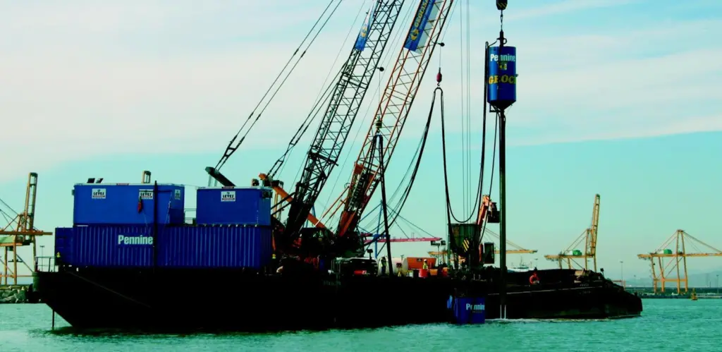Pennines crane barge at work in the Port of Valencia.