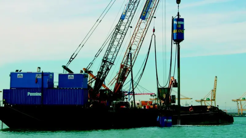 Pennines crane barge at work in the Port of Valencia.