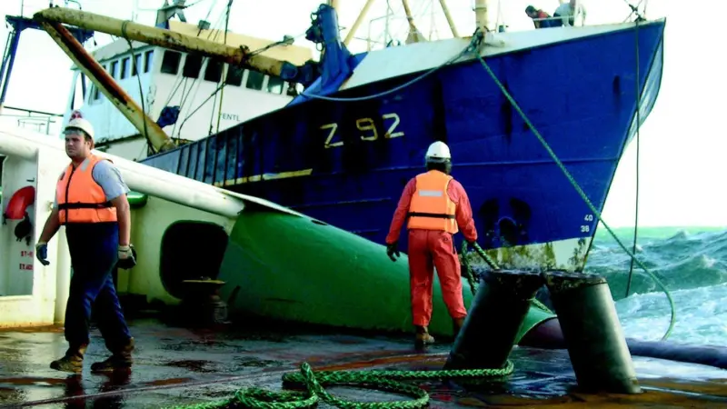 The crew of Anglian Earl get close up and uncomfortable to take the Yentl in tow.