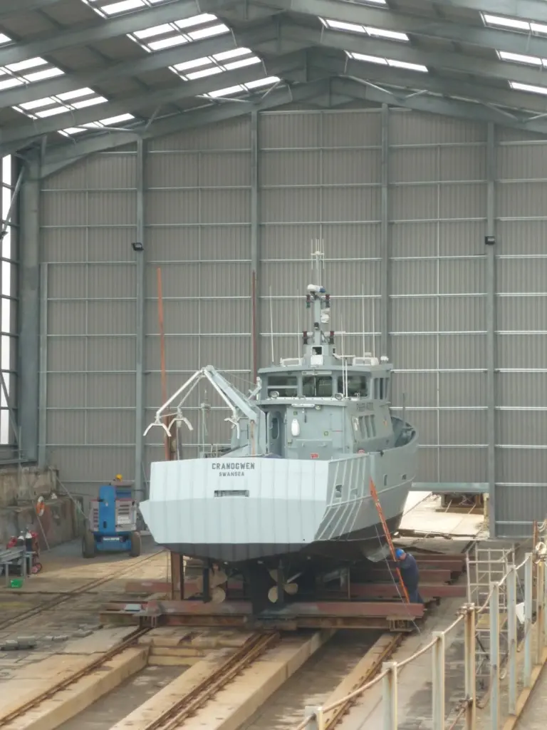 The 19m Seafisheries vessel MFPV Cranogwen is seen undergoing its 2010 refit  totally under cover in Mustang Marine’s new Pembroke Dock facility.