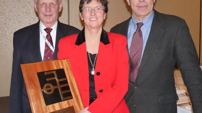 Bridget Hogan, NI, Captain George Sandberg NI, and right, John Gormley, editor of Professional Mariner who made the presentation.