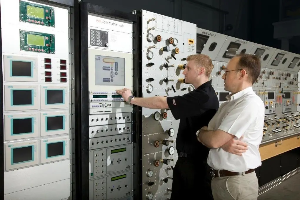The HeliCom Matrix alongside other life support instrumentation within the control room of a saturation diving system at the Divex headquarters in Westhill, Scotland.