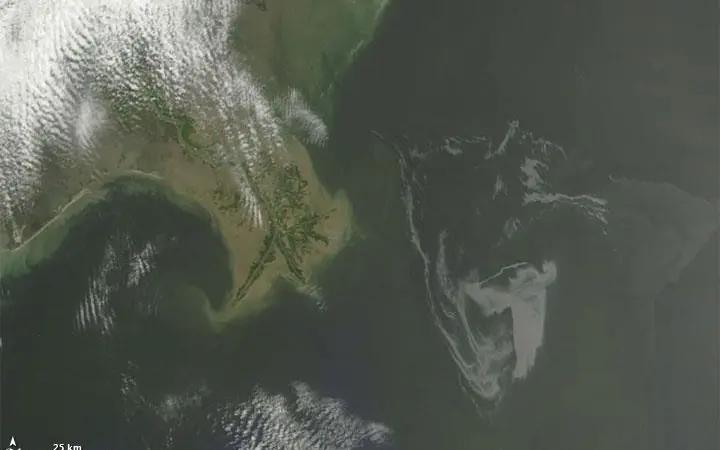 The oil spill has been growing at a rate of an estimated 210,000 gallons a day. Photo: NASA.
