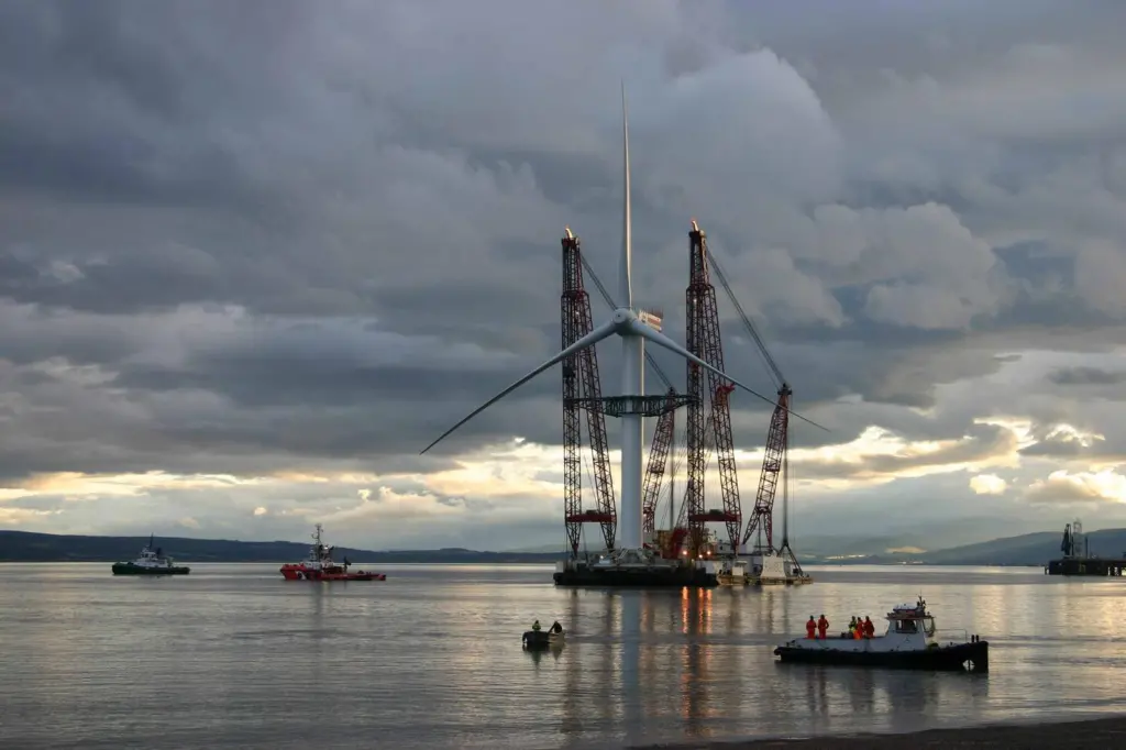 The floating sheerlegs Rambiz prepares to deliver a wind turbine for installation from Cromarty Firth.