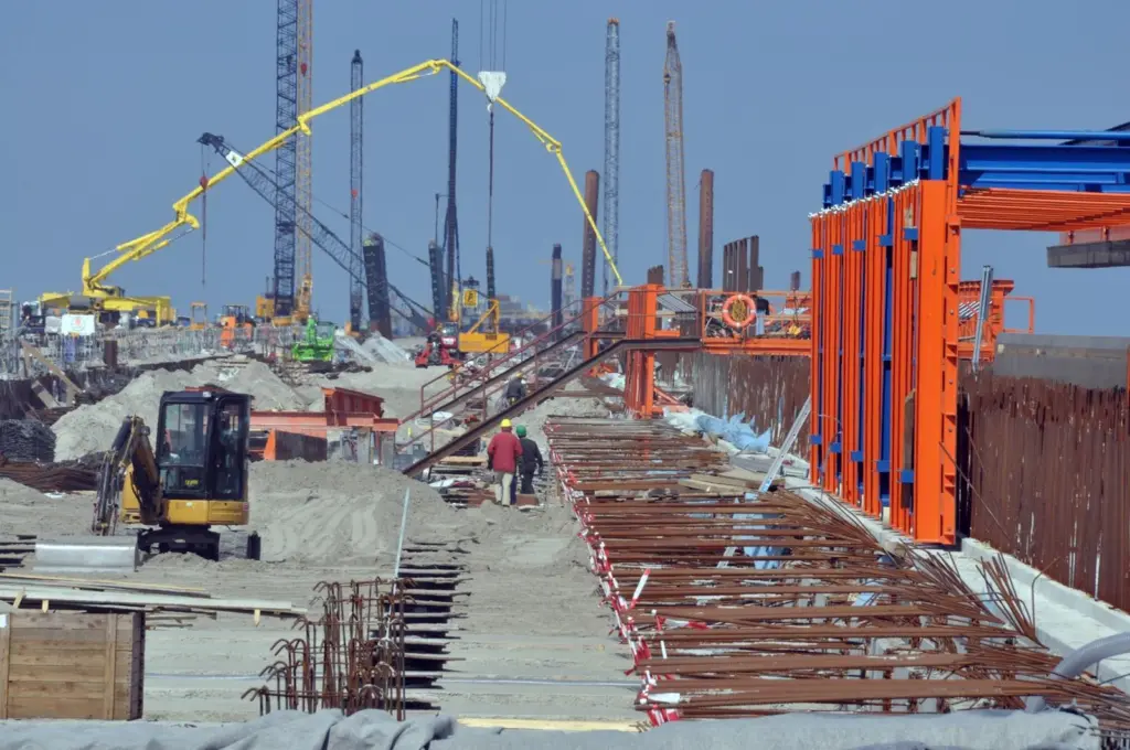 Local officials and the future operators of JWP are in dispute over when it will be completed.