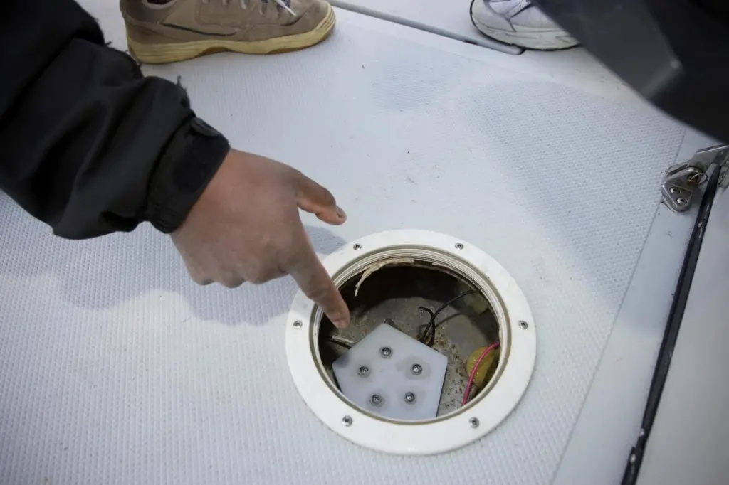 Stan Woodard points out his wireless fluid level measurement system, a spinoff technology originally developed to retrofit ageing aircraft with vehicle safety monitoring equipment.