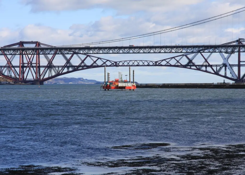 The jack-up Haven Seajack 1 is seen with both the Forth rail and road bridges in the background.