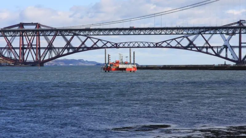 The jack-up Haven Seajack 1 is seen with both the Forth rail and road bridges in the background.