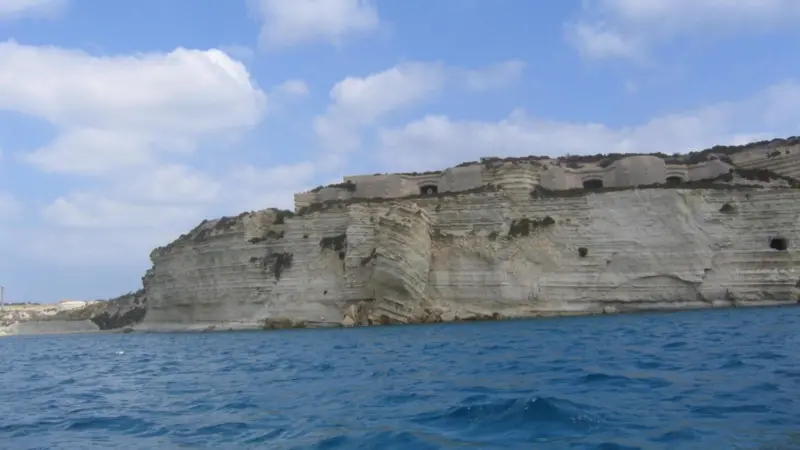 The wave climate in the vicinity of Marsaxlokk Bay sets design parameters which must address protection for the fishing village whilst mitigating against fairway infilling