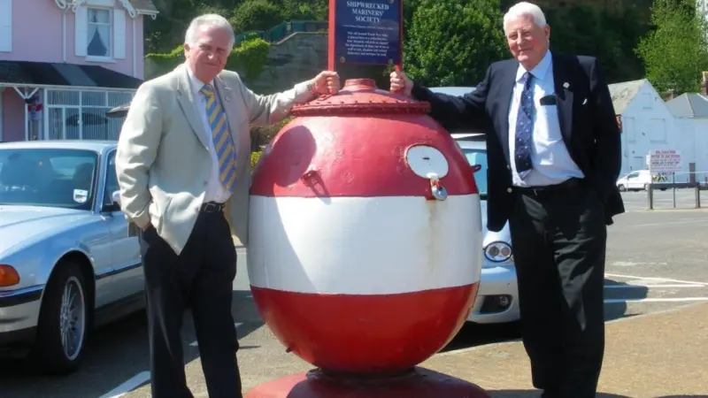 Shipwrecked Mariners’ Society CEO Malcolm Williams (left) is seen with ‘honorary agent’ volunteer Philip Woodford on the Isle of Wight, where one of the Challenge Walks will take place.