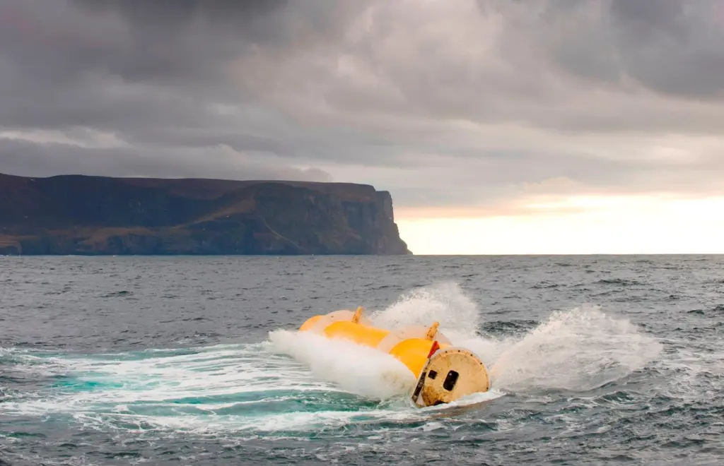 The Oyster 1 hydro-electric wave energy converter is seen in operation at the European Marine Energy Centre in Scotland.