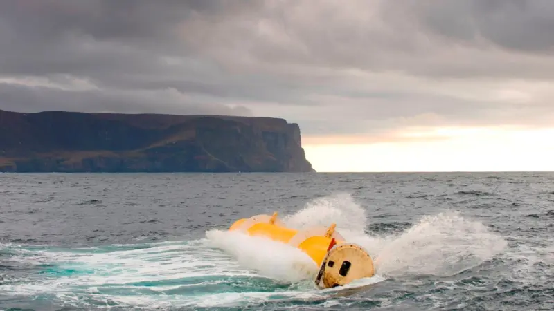The Oyster 1 hydro-electric wave energy converter is seen in operation at the European Marine Energy Centre in Scotland.