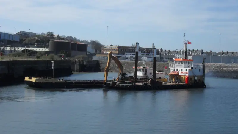 The backhoe dredger 'Doreen Dorward' working on site at Millbay’s Inner Basin.