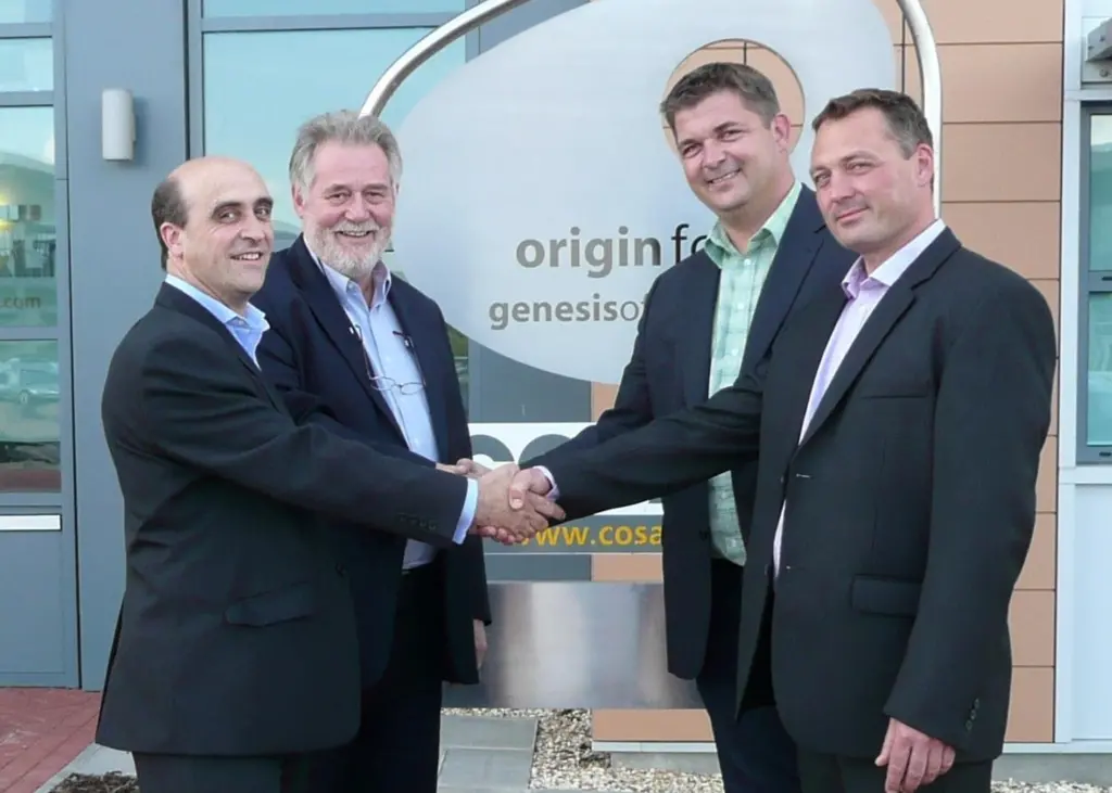 Cosalt's company secretary Neil Carrick, managing director of Cosalt's renewables business Winston Phillips and Henrik Moeller-Jensen and Lauge Fredhave, the joint owners of APRO, shake hands after the deal was signed.