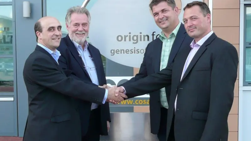 Cosalt's company secretary Neil Carrick, managing director of Cosalt's renewables business Winston Phillips and Henrik Moeller-Jensen and Lauge Fredhave, the joint owners of APRO, shake hands after the deal was signed.