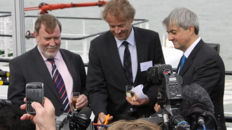 MJ’s Peter Barker joined the mainstream media scrum on board the Pride of Burgundy last week to photograph, left to right, Bob Bayford, Leader Thanet District Council; Øystein Løseth, President and CEO of Vattenfall; and Chris Huhne MP, Secretar...
