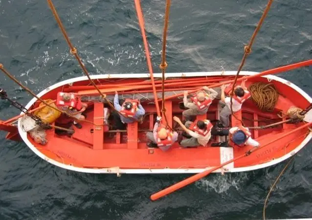 Launching a lifeboat during a mandatory drill.