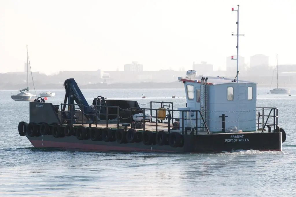 Frank-T is a heavy duty workboat capable of carrying up to 10 tons of cargo on deck whilst maintaining a draft of just 750mm in the shallow tidal environment of Wells Harbour.