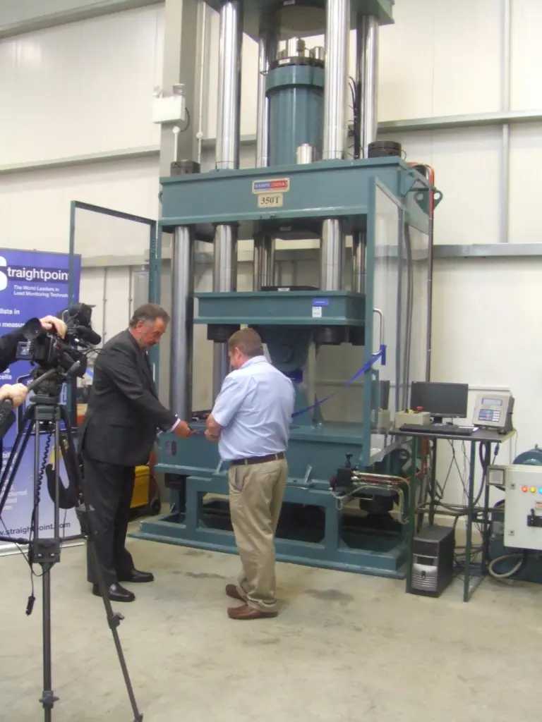 Deputy Mayor of Havant, Councillor Ken Smith with David Ayling, MD of Straightpoint, officially launching the new 350 Ton Calibration and Universal Test Machine.