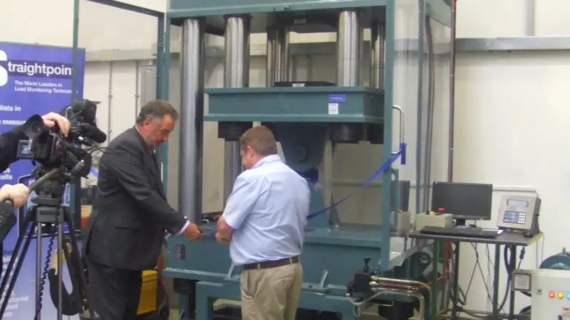 Deputy Mayor of Havant, Councillor Ken Smith with David Ayling, MD of Straightpoint, officially launching the new 350 Ton Calibration and Universal Test Machine.
