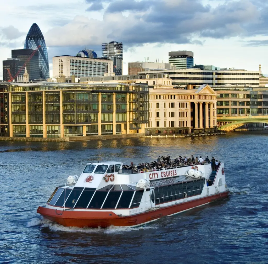 M.V. Millennium of London is seen passing through the City of London.
