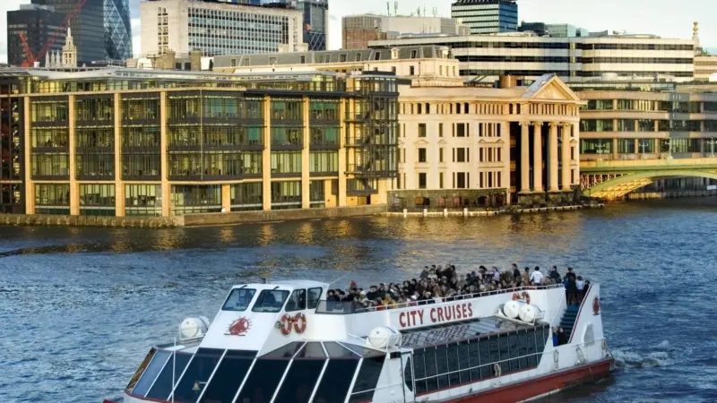 M.V. Millennium of London is seen passing through the City of London.