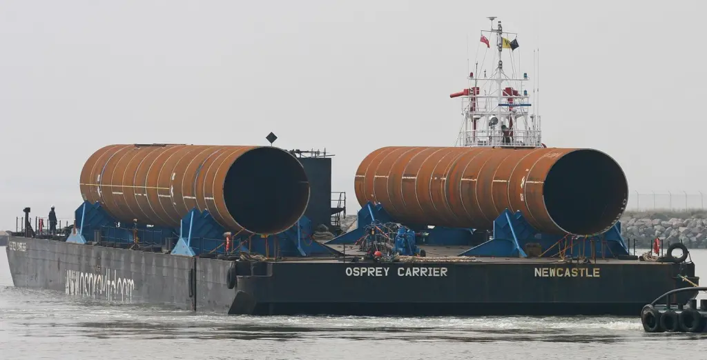 Substantial volumes of steel go into the construction of offshore wind farms, such as these monopole foundations delivered to the UK Port of Ramsgate for the Thanet Offshore Wind Farm. Photo by Peter Barker.