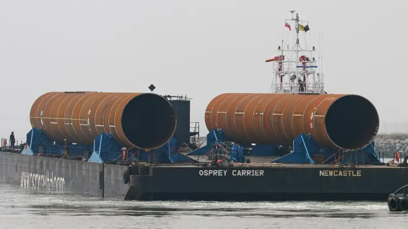 Substantial volumes of steel go into the construction of offshore wind farms, such as these monopole foundations delivered to the UK Port of Ramsgate for the Thanet Offshore Wind Farm. Photo by Peter Barker.
