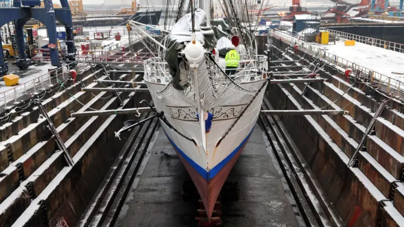 Snow did not halt restoration works on the Christian Radich, seen in drydock last month at A&P Tees.