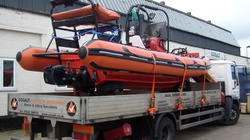 One of the P&O RIBs arriving on a low loader at Cosalt's Lowestoft branch prior to servicing.