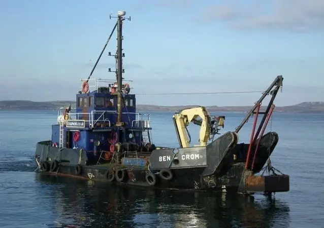Dredger ‘Ben Crom’ at work in Tayinloan, a regular task. Many operations would be made easier by streamlining applications. Photo: P Mackie
