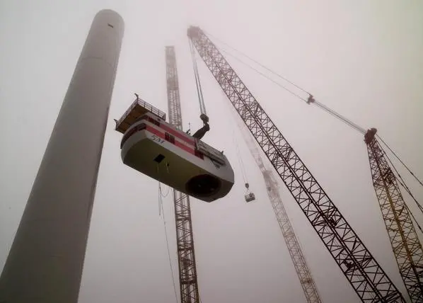 The Turbine B rotor assembly is lifted for the Beatrice Wind Farm Demonstrator Project in Scotland’s Moray Firth. The project included two 5MW turbines, the world’s largest at the time. Photo: Beatrice – Talisman Energy