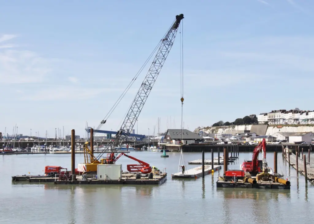 VolkerBrooks Linkflote pontoons were used during the installation of the Marinetek breakwater pontoons in the east outer marina. Photo: Peter Barker